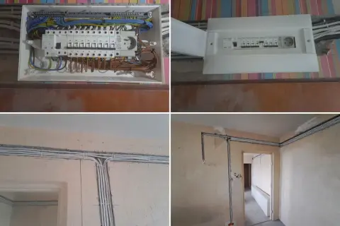 Nowe przewody i bezpieczniki w mieszkaniu. Trwa wymiana instalacji elektrycznej, widać rozdzielnicę i ułożone kable.
