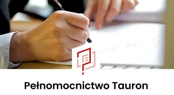 Dłoń pisze długopisem na dokumencie. Logo i napis "Pełnomocnictwo Tauron" sugerują formalne sprawy związane z firmą.